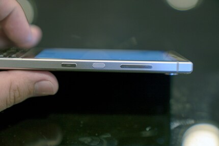 All side buttons are located on the right side