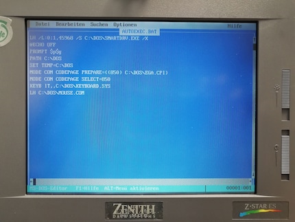 After «KEYB» there is now «IT». The mouse driver is loaded in the last line.