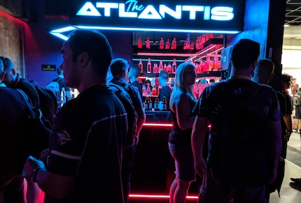 The cyberpunk-style bar and drinks sweetened the wait.