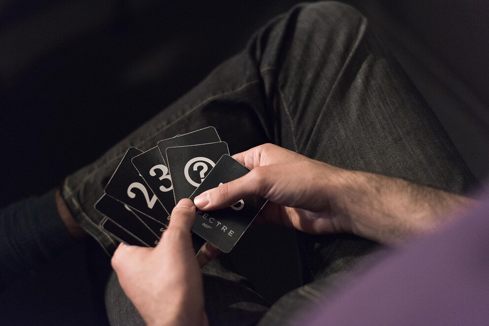Black playing cards indicate estimated time requirements