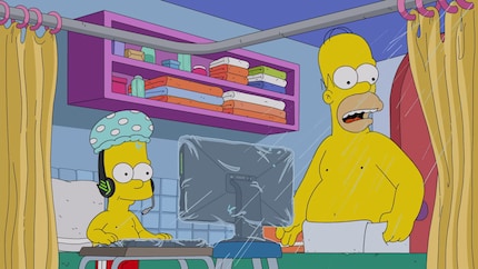 Gaming in the shower. Natural to everyone except Homer.