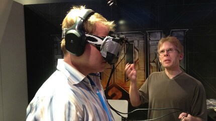 John Carmack shows journalists the first version of the Oculus Rift.
