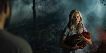 Elizabeth Banks surprises in her role as a loving mother.