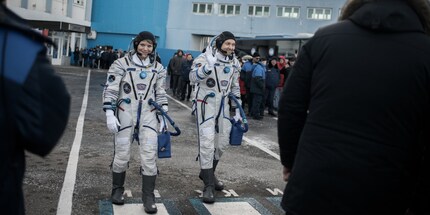A picture from happier times? Anne McClain, left, on her way to the ISS. Source: The New York Times