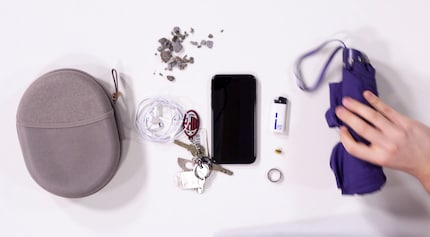 With umbrella, charm and bunch of keys into the war.