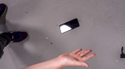 The iPhone 11 flies through the air - from a height of about one metre.
