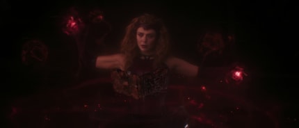 What secrets does the Book of the Damned reveal to her?