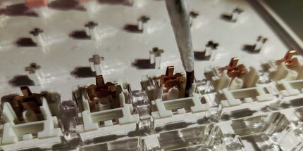 Lubricating the lower part of the housing.