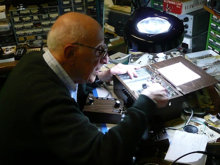 Ralph Baer in his basement with the Brown Box.