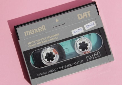 A DAT cassette is slightly smaller than an analogue audio cassette.