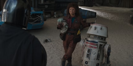 Peli Motto and R5-D4, hero of the galaxy. 
