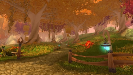 In truth, I prefer colourful and idyllic fantasy environments like this one. Pictured: the Eversong Woods from World of Warcraft.