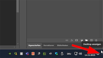 Klicke neben die Glocke, um alle Fenster zu minimieren oder drücke «Windows+D».