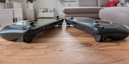 In terms of appearance, the only differences between the Steam Deck OLED and the original are the orange power button and black analogue sticks.