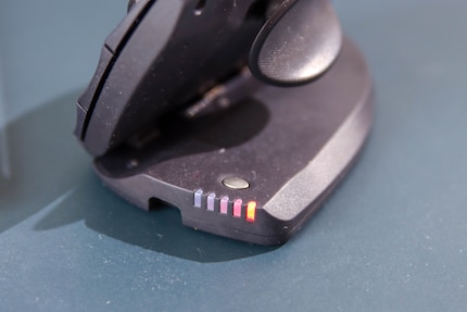 The LEDs indicate the mouse speed and charging status.