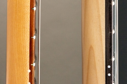 The fretboard is much thicker than on my Fender Stratocaster.