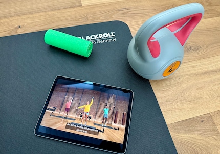 Le coach sur iPad me montre ce que je dois faire.