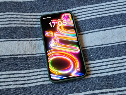 The new wallpaper for Pride Month looks different on the lock screen than on the home screen.