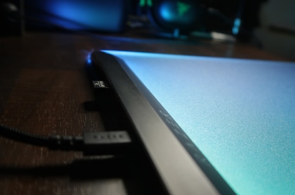There’s a USB-A slot on the bar at the back.
