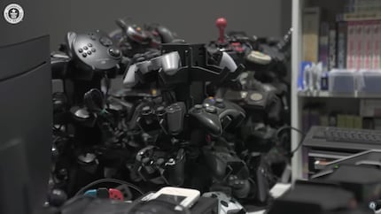Multiple spindles hold the numerous game controllers.