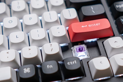The LED shines through from the bottom of the switches. As a result, the lighting isn’t as bright as a gaming keyboard’s.