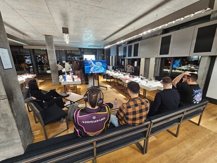 The audience joined in the excitement. Both in front of the big screen...