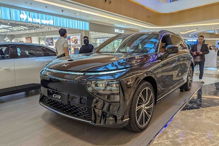 The Xpeng G9 SUV in a shopping centre