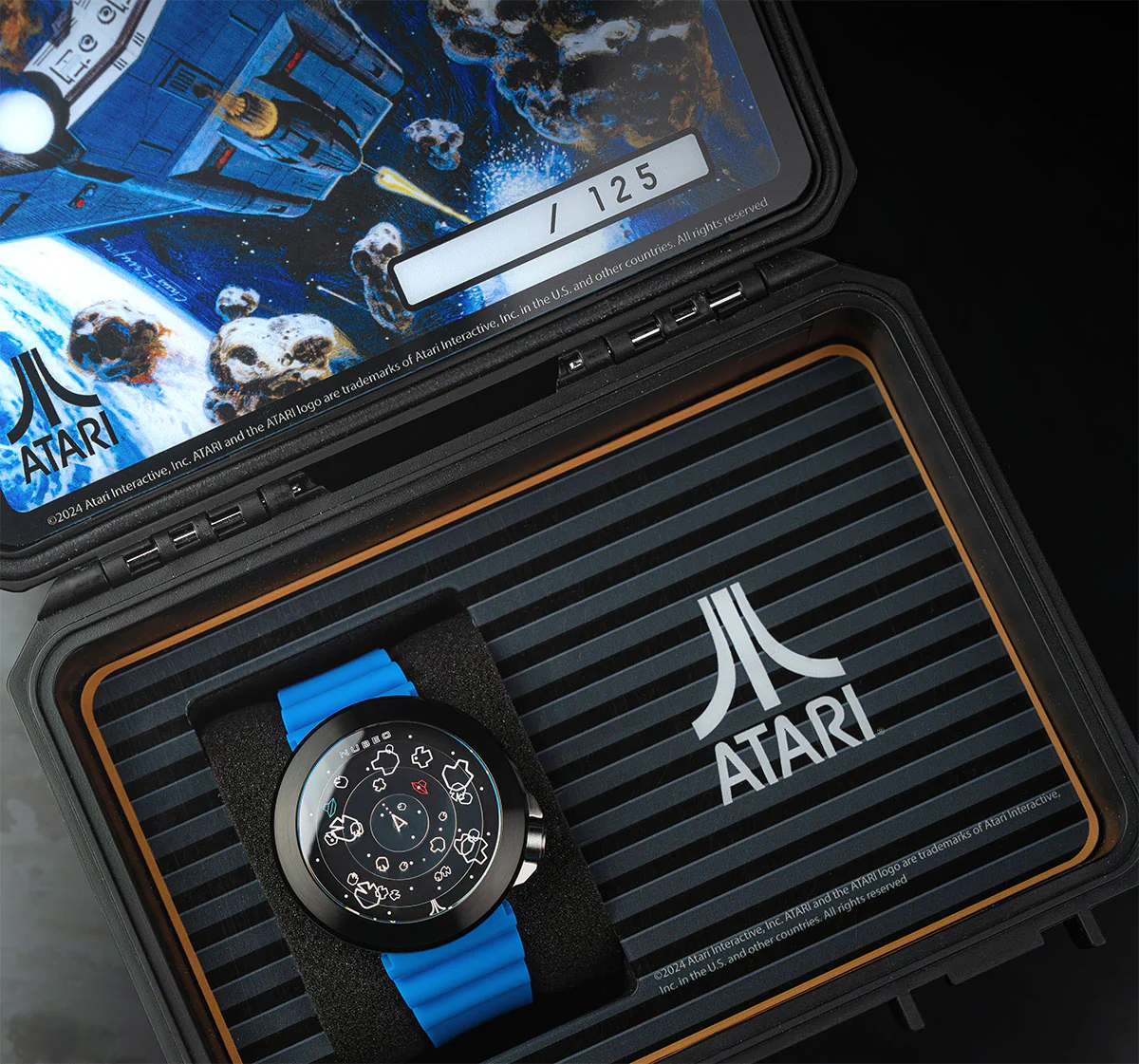 The watch comes in a protective case reminiscent of the Atari VCS.