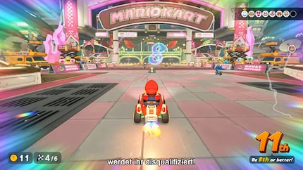 Mario nähert sich einem Checkpoint und muss mindestens an achter Stelle durchfahren..