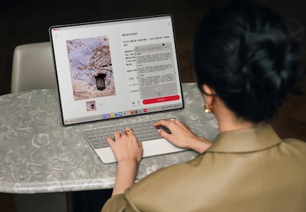 The MateBook Fold runs HarmonyOS 5 instead of Windows 11.