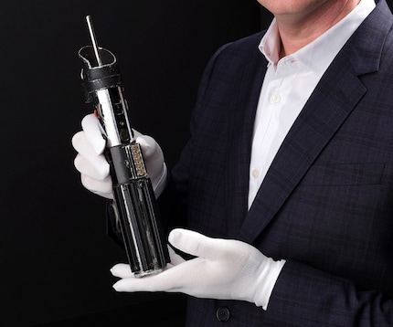 The handle of the lightsaber looks pretty used.